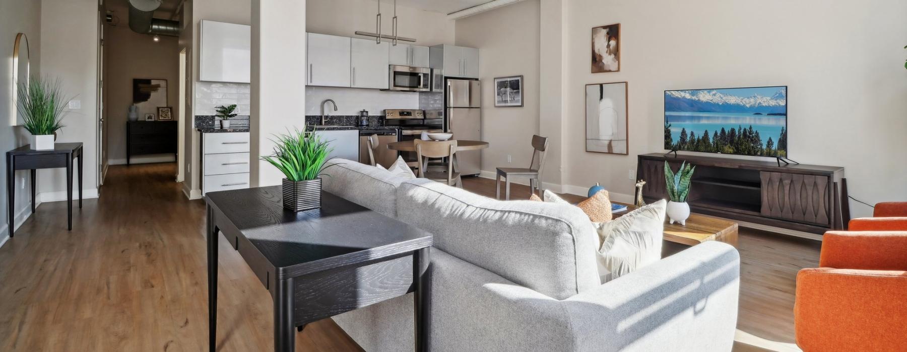 a living room with a couch and a table