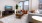 a living room with a tv and couches