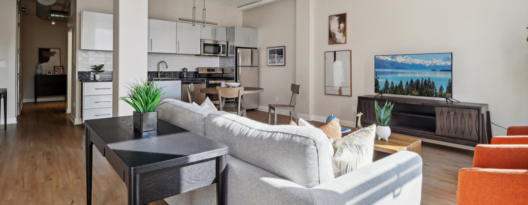 Open space living area with natural lighting