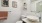 a bathroom with a sink toilet and a mirror