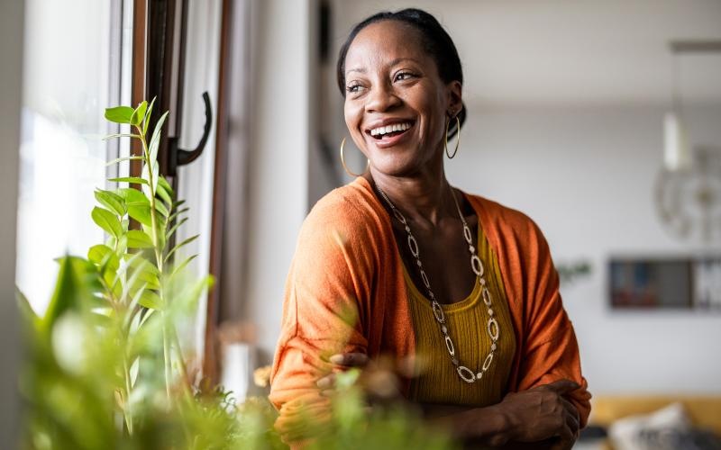 a person smiling and sitting