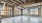 a large room with windows and a large floor