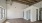 a room with white walls and wood floors
