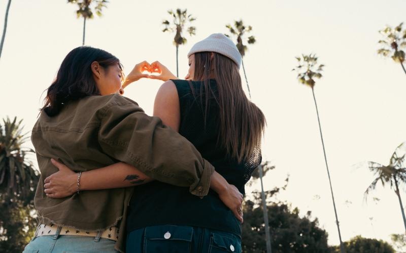 two people under palm trees